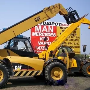 Телескопический погрузчик Caterpillar TH 580