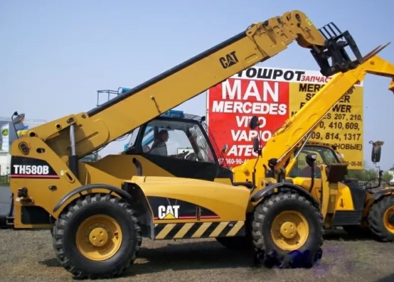 Телескопический погрузчик Caterpillar TH 580